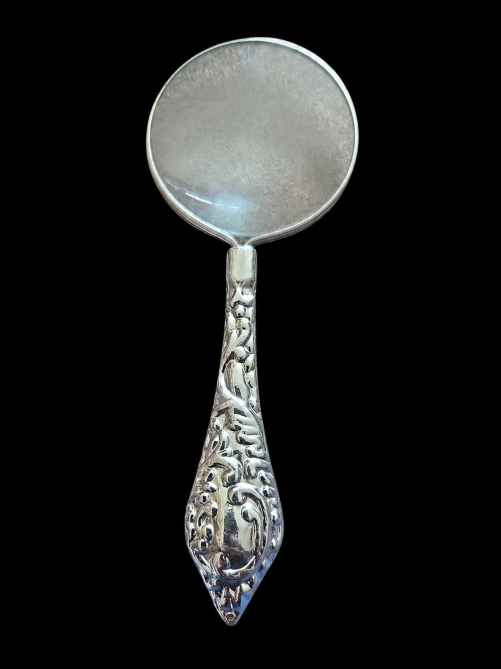 Beautiful vintage magnifying glass with detailed ornate